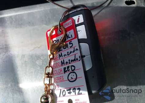 2015 Mazda Mazda3 I Sv z USA, uszkodzony, nr VIN JM1BM1T7XF1249890